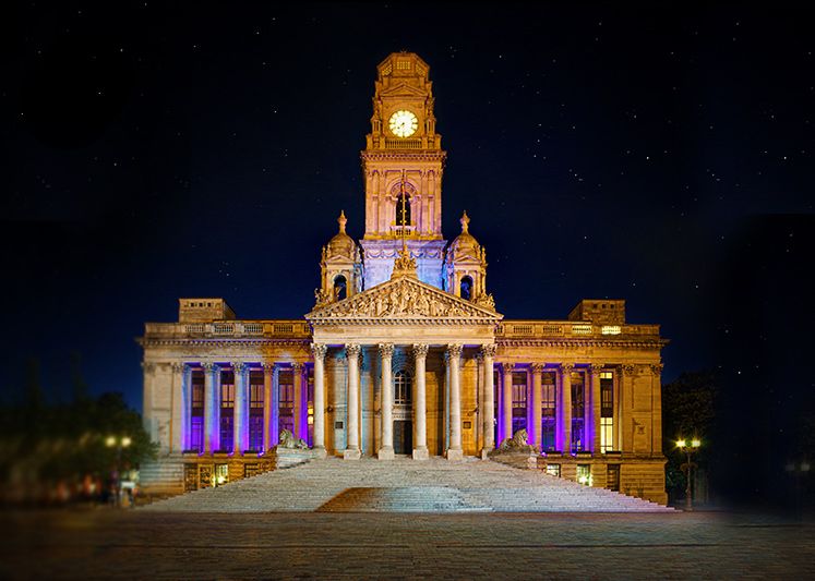 Nighttime view of Portsmouth Guildhall