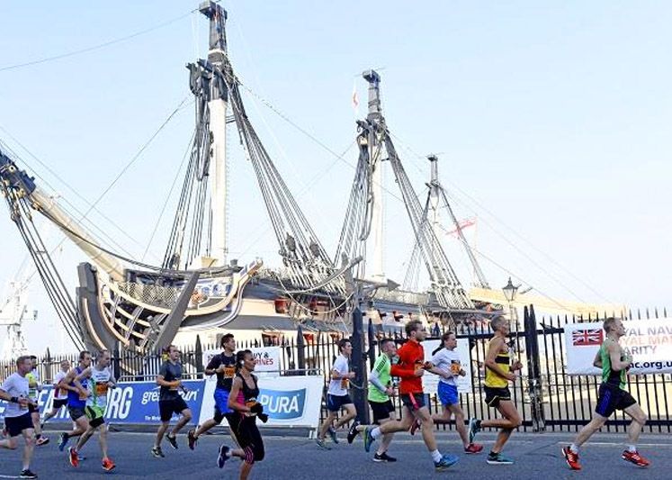 Runners near HMS Victory